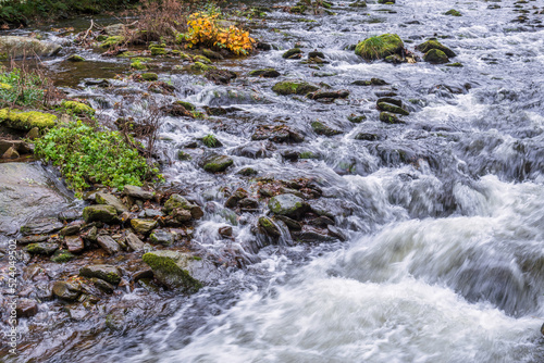 View of fast flowing water in the East Lyn River