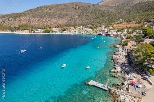 Aerial panoramic photo of Limeni the picturesque  villlage with the turquoise waters and the stone buildings under Areopoli, peloponnese , Greece.