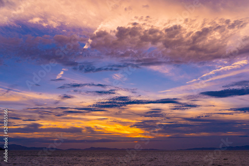Fototapeta Naklejka Na Ścianę i Meble -  長松海岸から見る淡路島へ沈む夕日