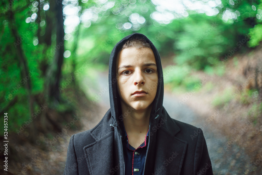 Portrait of a sad boy outside in nature Portrait of a sad boy outside in nature