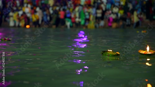  Lamp and flowers in the ganges haridwar photo