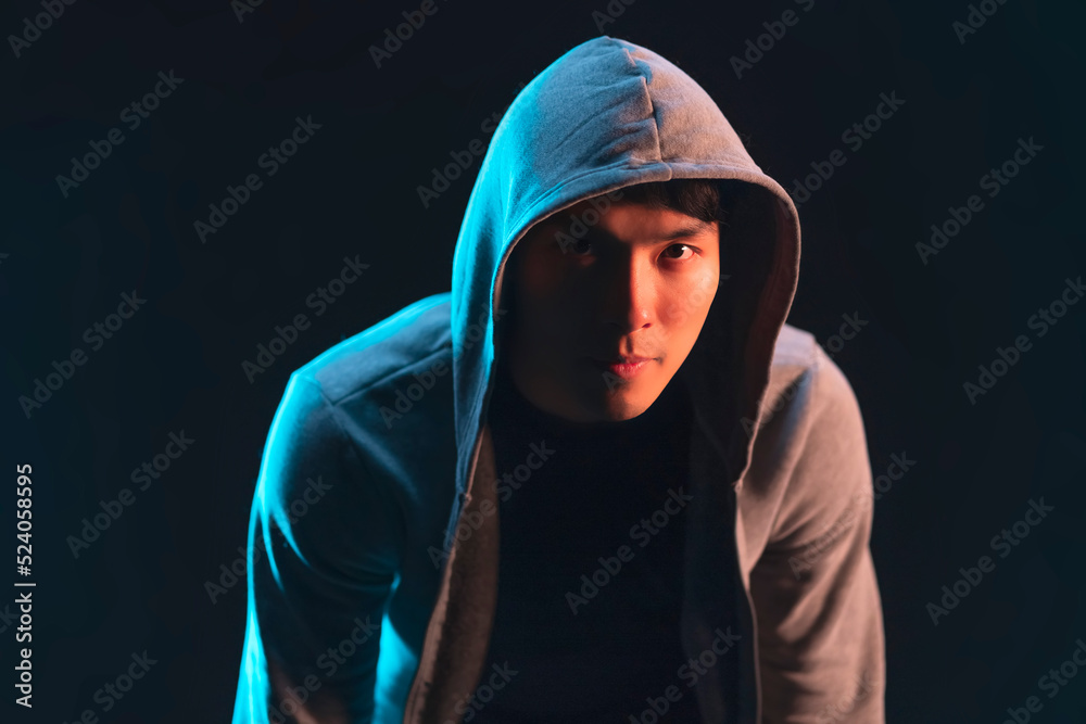 asian sport man male with jacket hood ready to workout concentrate focus action pose studio shot on dark background,action sport fashion stylish studio shot closeup half body asian sport man male with jacket hood ready to workout concentrate focus action pose studio shot on dark background,action sport fashion stylish studio shot closeup half body