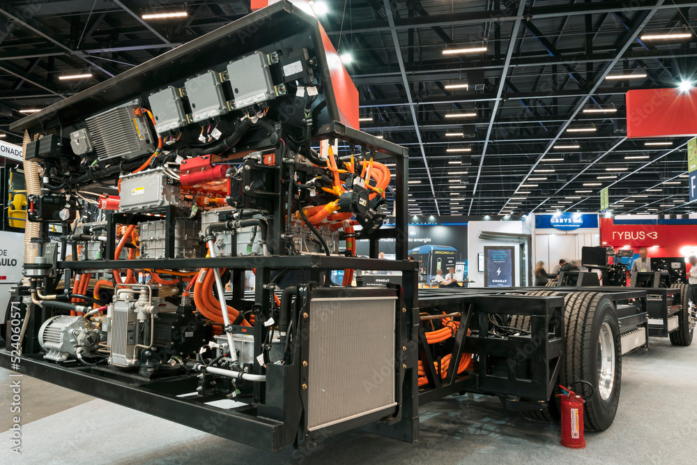 Electric bus chassis, engine and battery detail on display at the LAT.BUS  2022 fair, held in the city of São Paulo. Stock Photo | Adobe Stock