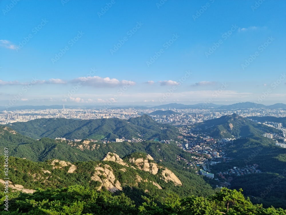  summit of mountain overlooking the city
