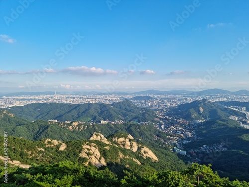  summit of mountain overlooking the city