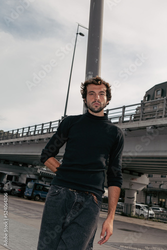 A stylish portrait of a charismatic man in the city 
