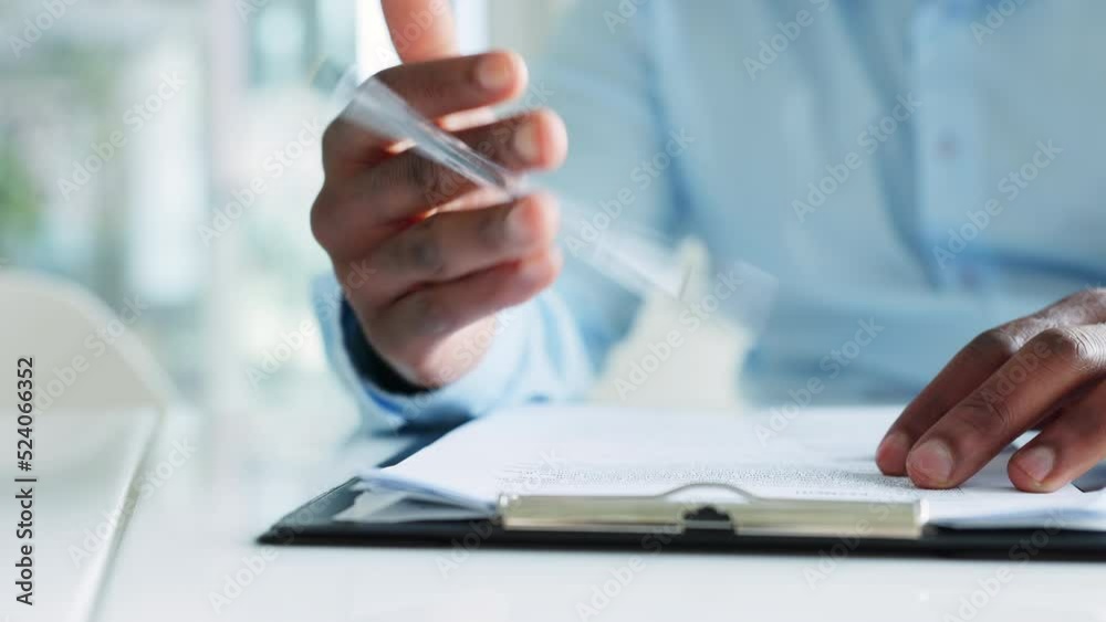 Anxious business man reading contract or form, waiting before signing document. Closeup of nervous male hands thinking or contemplating decision and writing on paperwork, tapping pen on clip board.