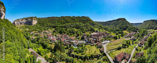 Aerial view above the french village of Baume-les-Messieurs in the Jura, Bourgogne-Franche-Comté. one of the Plus Beaux Villages de France