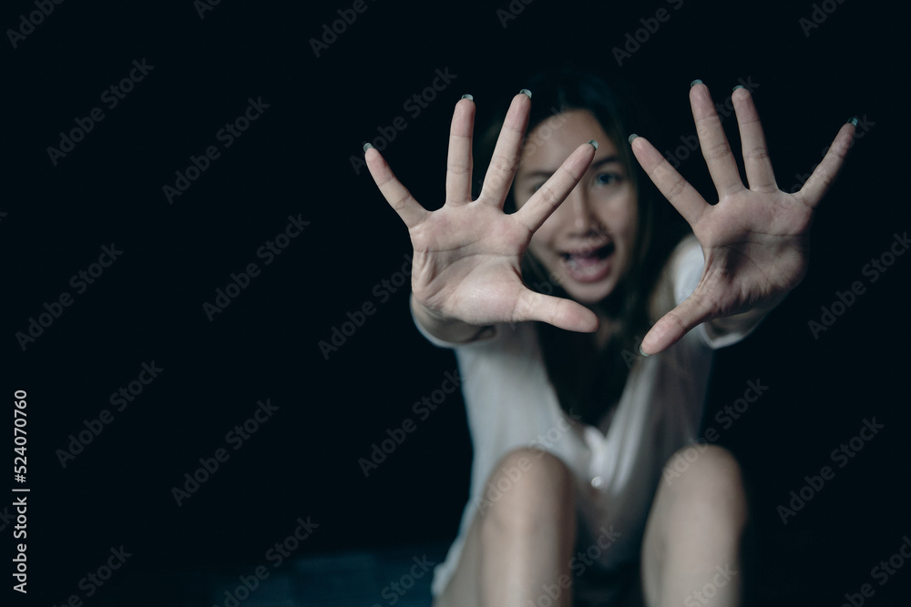 Stop hurting woman! young female person raised her hand for stop violence, sexual abuse, human trafficking, domestic violence and rape, International Day for the Elimination of Violence against Women