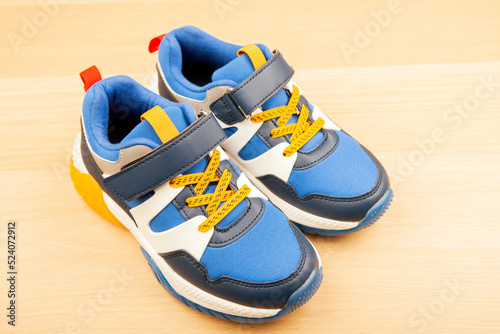 image of sneakers wooden desk background 