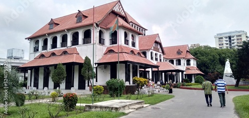 Ia Zia Memorial Museum in Chittagong, Bangladesh with people walking by photo