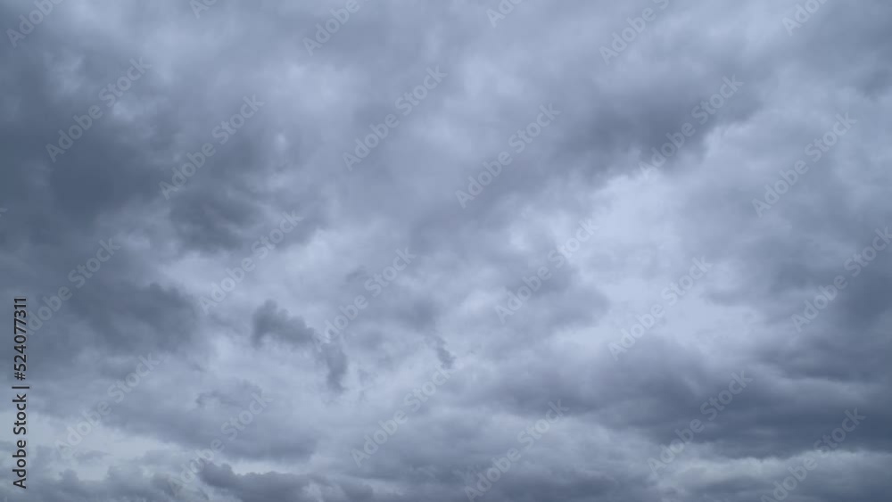 Dramatic sky with storm cloud on a cloudy day time lapse.