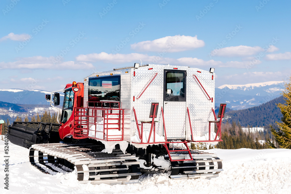 Ταπετσαρία Red modern snowcat ratrack with snowplow,snow grooming machine,remover truck preparing ski slope,piste,hill at alpine skiing winter resort