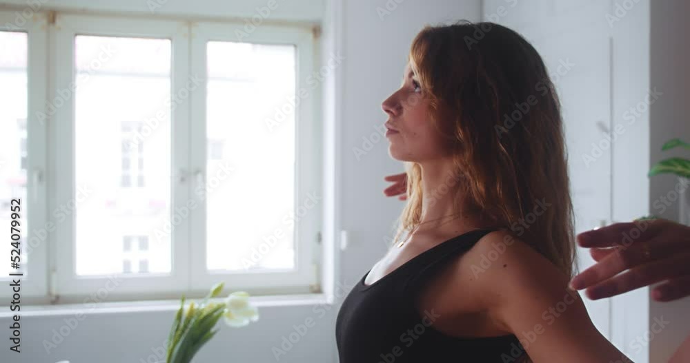 Woman Doing A Hand Moving Meditation In A Quiet Room. - close up Woman Doing A Hand Moving Meditation In A Quiet Room. - close up