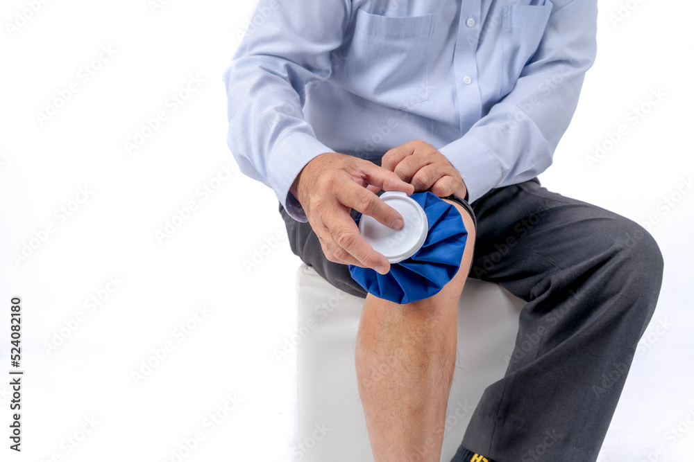 Health problems Injured leg, Senior man applying ice pack on leg, Elderly man enduring awful ache, old man with suffering having painful expression leg.