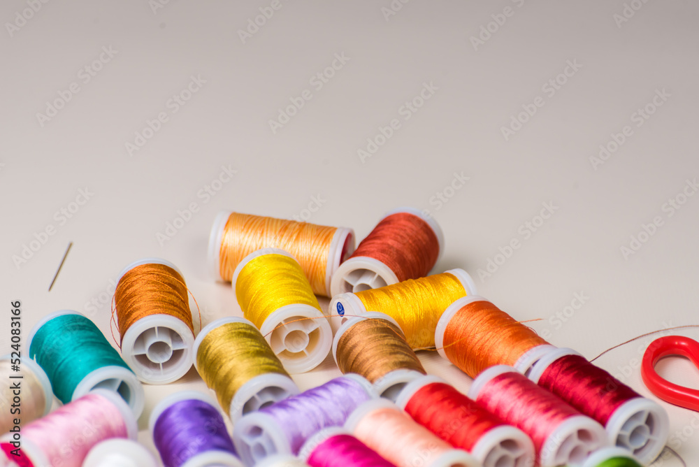 copy space, threads and needle, scissors, dressmaker, workshop, sewing, sewing clothes, cloth embroidery, selective focus copy space, threads and needle, scissors, dressmaker, workshop, sewing, sewing clothes, cloth embroidery, selective focus