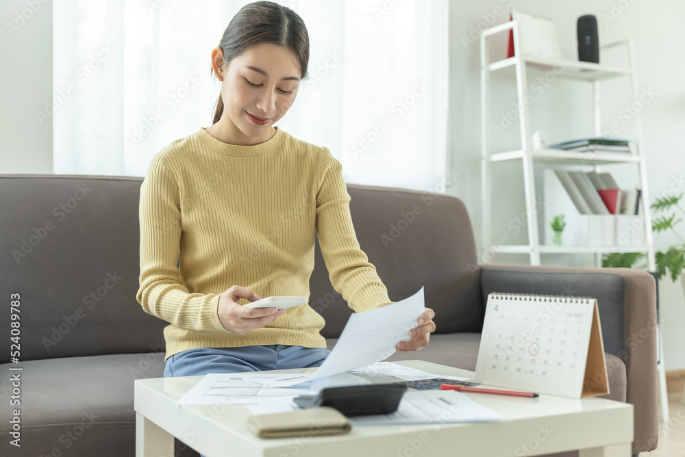 People using mobile bank applications pay bills at home. People using mobile bank applications pay bills at home.