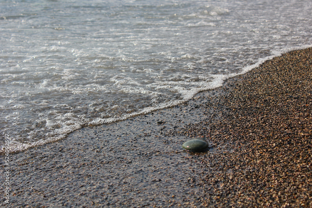 foam of the black sea near the rocky shore foam of the black sea near the rocky shore