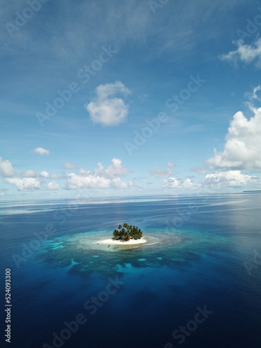 Uninhabited island JEEP island in Chuuk, Micronesia. Here is the world's greatest wreck diving destination. © Optimistic Fish
