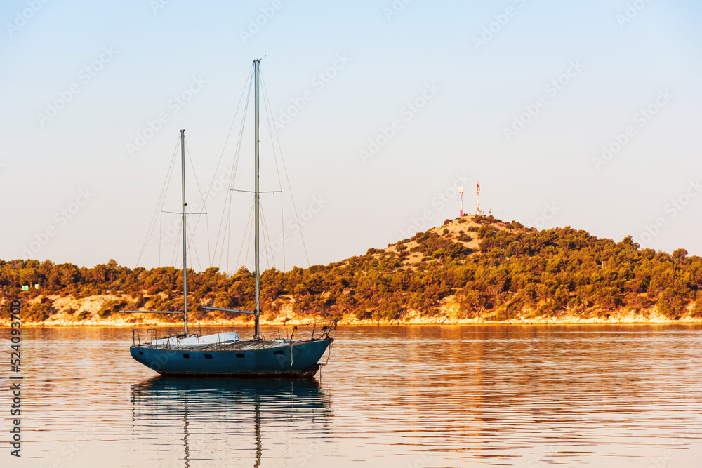 Sibenik, Croatia, a small sea vessel is moored off the coast