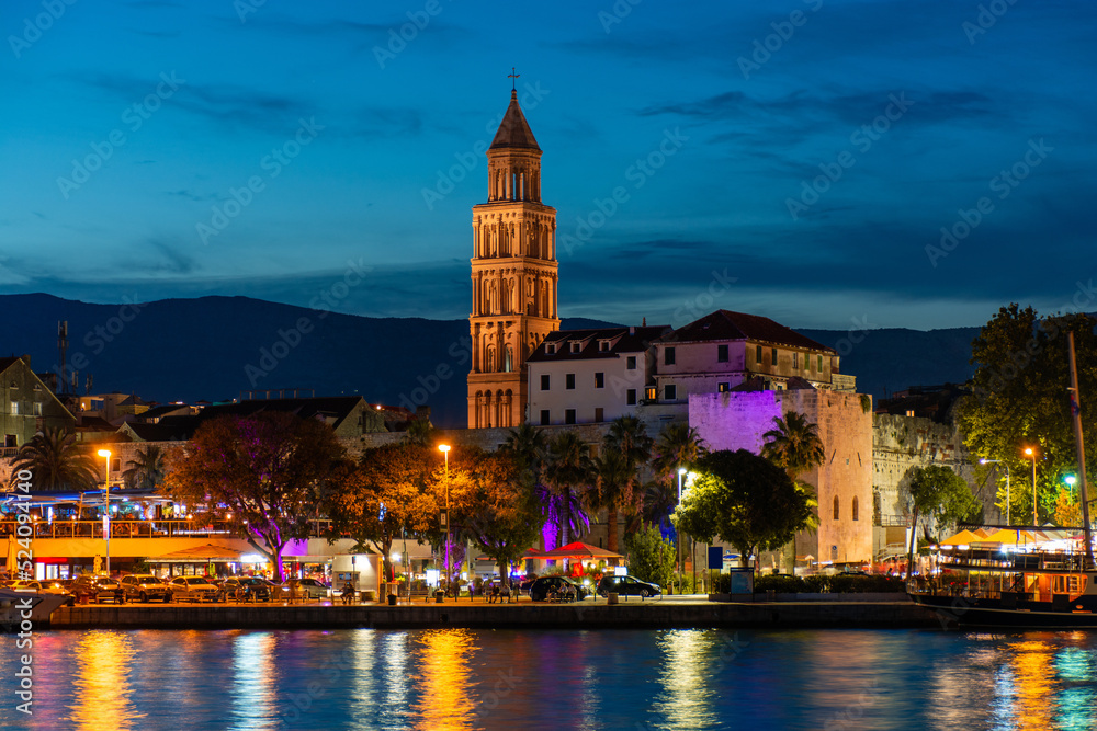 Evening city of Split in Croatia, reflection of the lights of the night city.