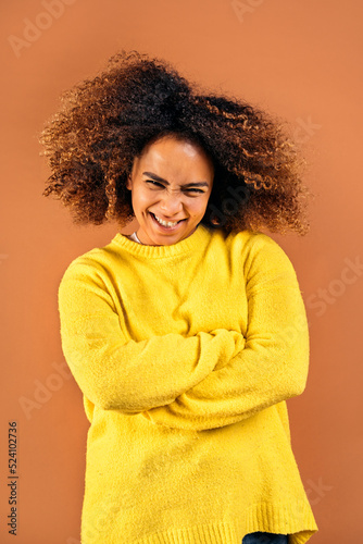 Cheerful Afro Woman in Studio © santypan