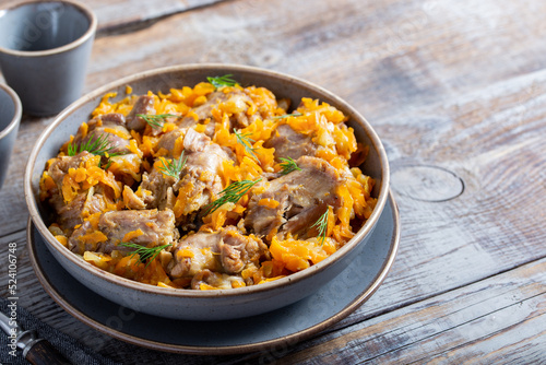 stewed turkey necks with vegetables, selective focus