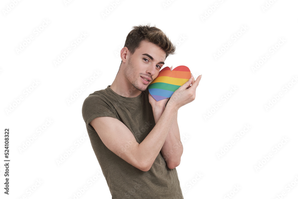 Young caucasian man smiling at camera with lgbt flag heart, isolated on white background. Young caucasian man smiling at camera with lgbt flag heart, isolated on white background.