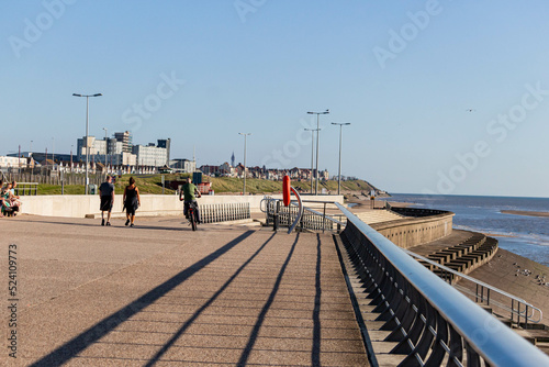 people walking on the pier © Robert