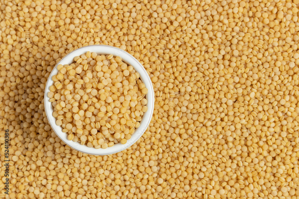 Coarse organic groats couscous. Top view. Coarse organic groats couscous. Top view.