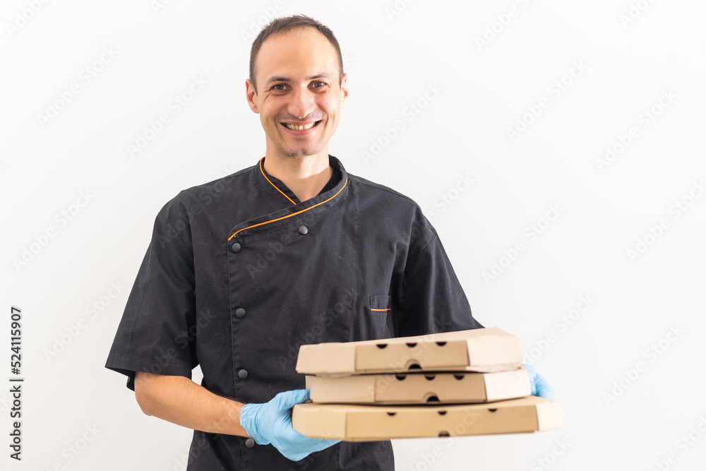 food delivery man wear gloves for cleanliness and hygiene, protect for pandemic and outbreak covid-19 or corona virus, use delivery service in social distancing and quarantine. food delivery man wear gloves for cleanliness and hygiene, protect for pandemic and outbreak covid-19 or corona virus, use delivery service in social distancing and quarantine.