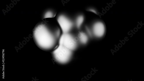 Abstract bubbles stuck together isolated on a black background. Design. Pulsating figure od same siza balls. photo