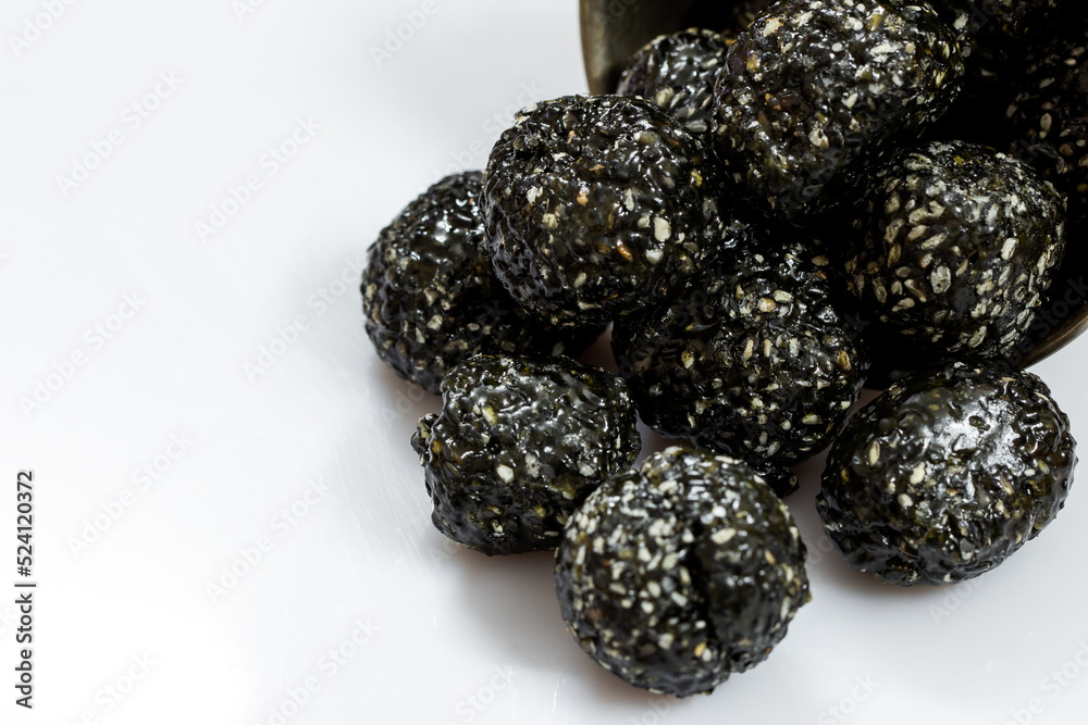 Black sesame laddu (also known as ellu urundai in tamil language) is made of sesame seeds and jaggery Black sesame laddu (also known as ellu urundai in tamil language) is made of sesame seeds and jaggery