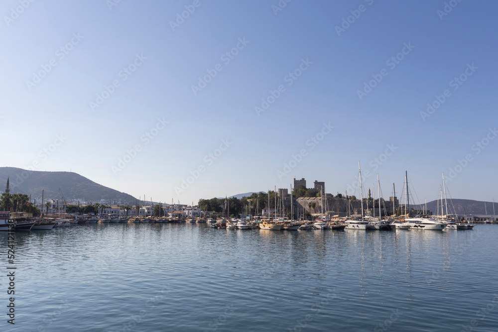 A quiet morning in Bodrum, Muğla, boats in the harbor and Bodrum Castle.