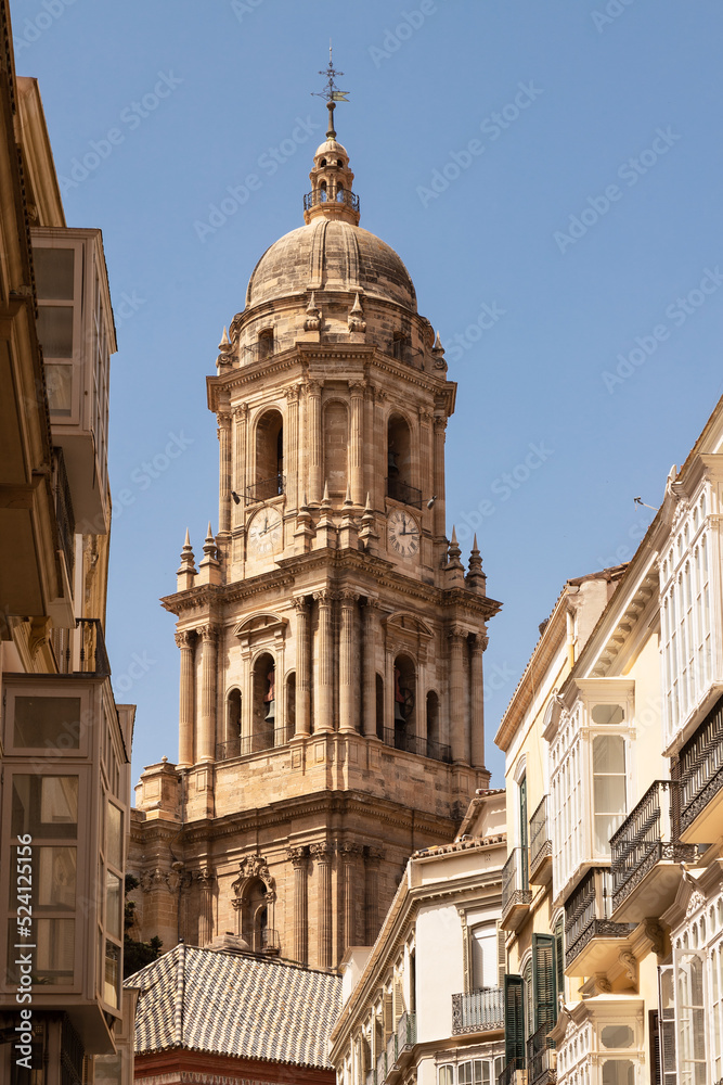 Fototapeta premium Church tower of the Malaga Cathedral or the Santa Iglesia Catedral Basílica de la Encarnación.
