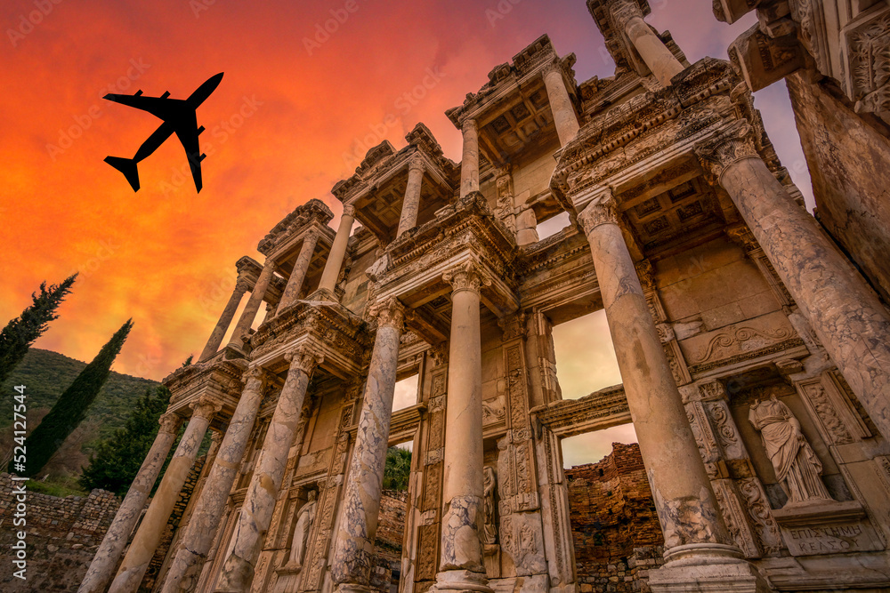 ephesus tourism destination celsus library burning sky and airplane