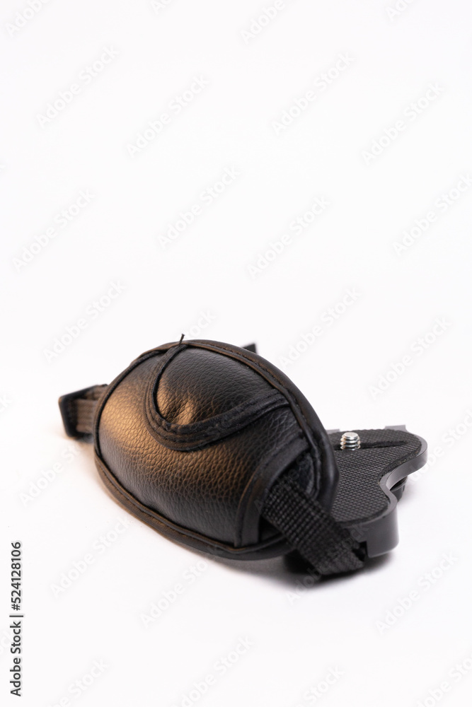 black leather camera strap on white background black leather camera strap on white background