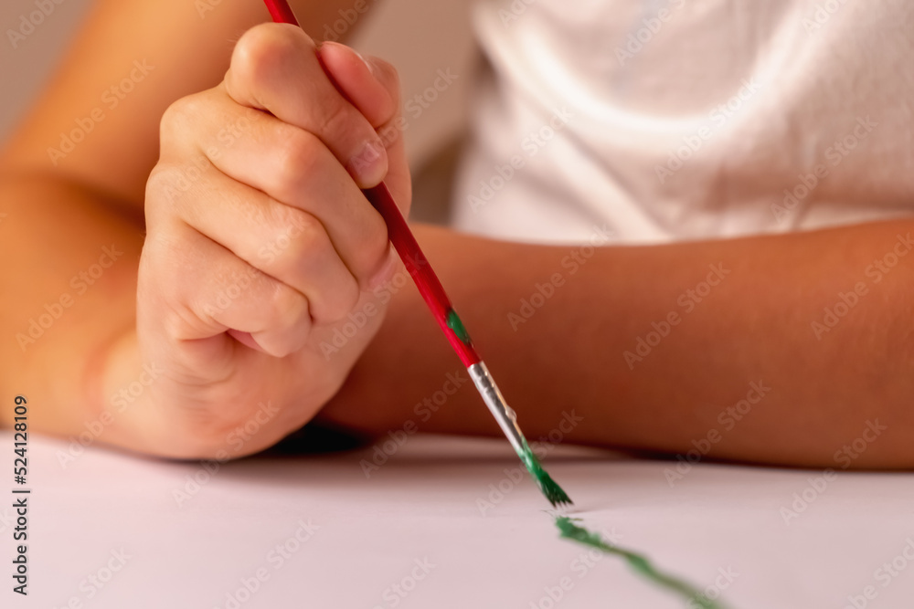 Portrait of beautiful child girl painting the picture. Art and education concept. Portrait of beautiful child girl painting the picture. Art and education concept.