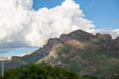 Push Ridge along the western edge of the Catalina Mountains in the Coronado National Forest north of Tucson. Monsoon storm clouds build behind a towering wall of rock. Pima County, Arizona, USA.