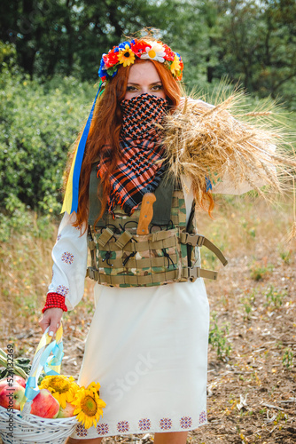 Ukrainian woman protects wheat fields. Ukrainian military resistance