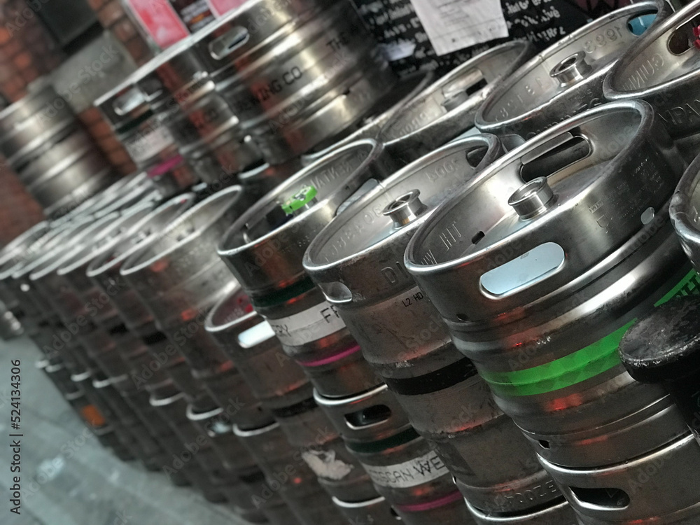 Beer kegs in the back alley behind a venue in Ireland Photos Adobe Stock