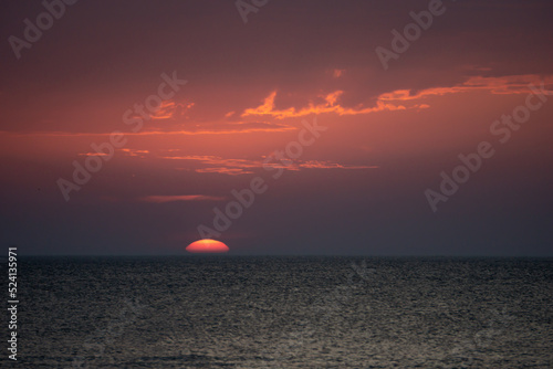 beautiful orange sunset over the sea © LINDA