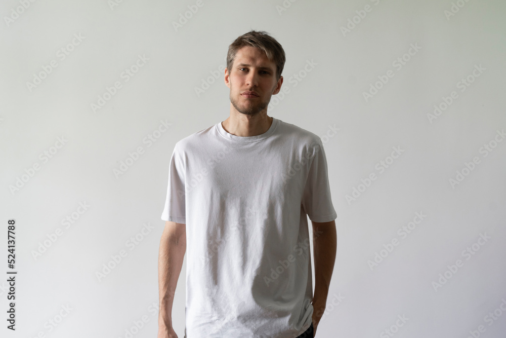 a male person in white blank shirt, mockup template a male person in white blank shirt, mockup template