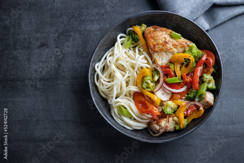 Noodles with vegetables in bowl