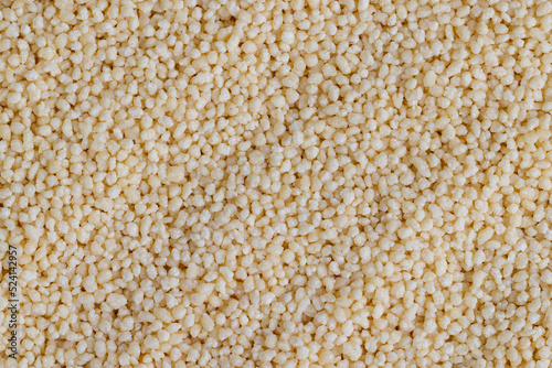 Slika na platnu Fresh raw porridge couscous from wheat or millet