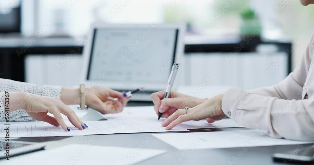 Hand signing documents, closeup of lawyer, banker and financial advisor advising where a client should sign. Woman signing a car insurance contract after checking terms and conditions.