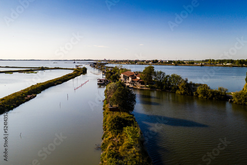 Aerial view of fishing lodges  Comacchio lagoon on sunset  Northern Italy
