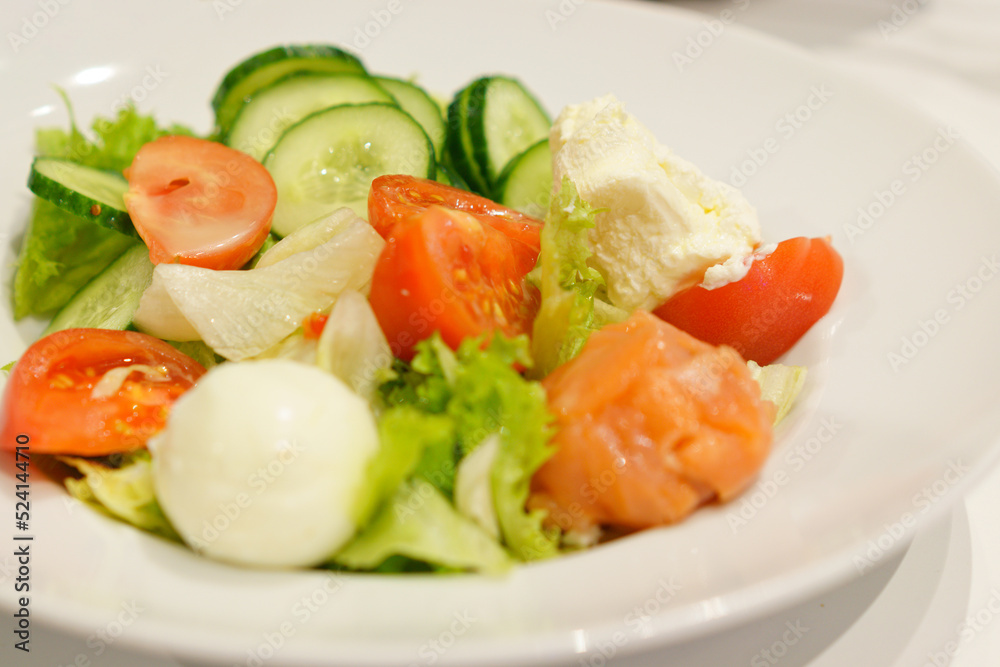 Salad made from cucumbers, tomatoes, eggs, and cabbage inside a white plate. Whole. Vitamin. Yellow. Dish. Onion. Ripe. Breakfast. Object. Eating. Cooked. Tomat. Bowl Salad made from cucumbers, tomatoes, eggs, and cabbage inside a white plate. Whole. Vitamin. Yellow. Dish. Onion. Ripe. Breakfast. Object. Eating. Cooked. Tomat. Bowl