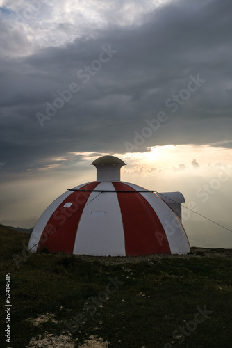 Tiganesti mountain refuge high at 2170m in Bucegi Mountains, Romania, at sunset photo