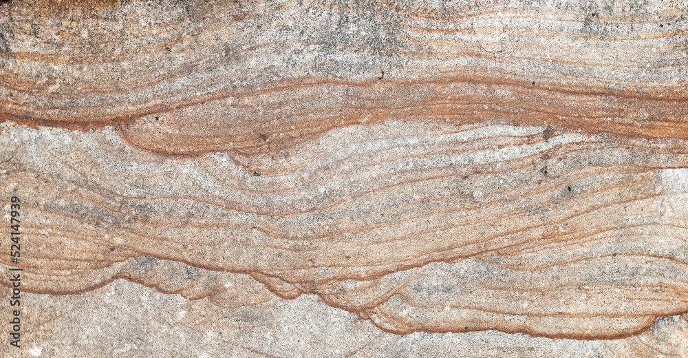 A colorful natural stone with layer structure as a background A colorful natural stone with layer structure as a background